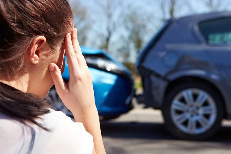 A young woman has a headache after a car crash in San Mateo.