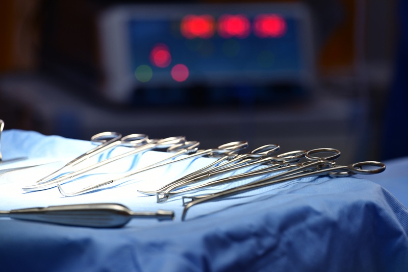 Close up image of an instrument in a tray of surgical instruments